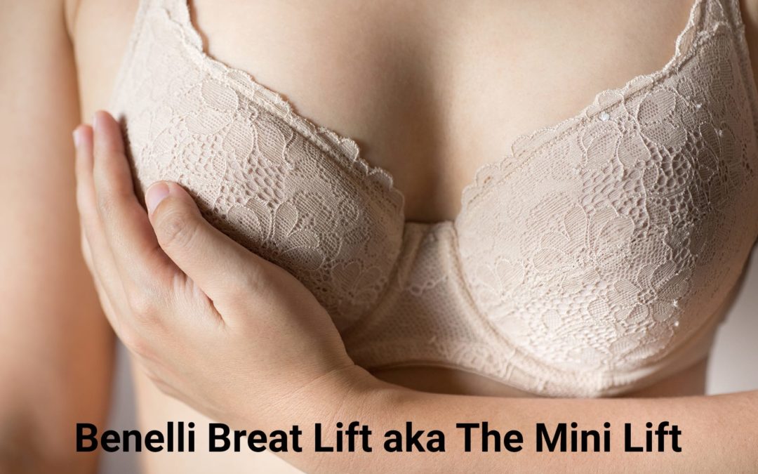 Woman in bra holding up one breast to replicate the affects of a Benelli Breast Lift.