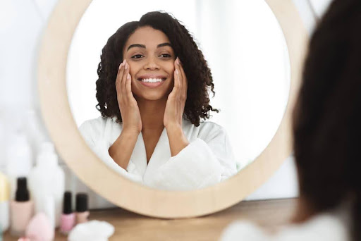 A young woman planning her HydraFacial aftercare to prolong the results.